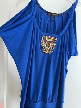 HEART SOUL spaghetti strap top with interesting beaded detail.